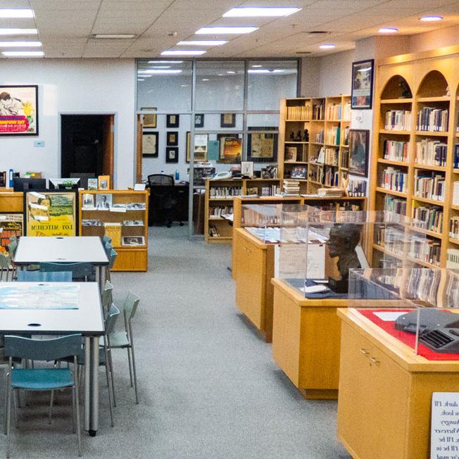 Interior of the Steinbeck Center with bookshelves and desks.